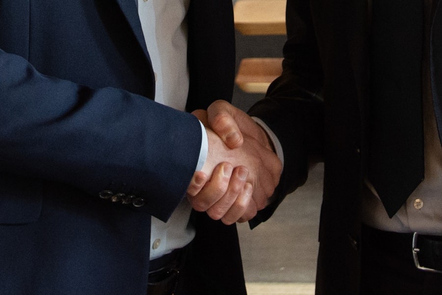 Business partners shaking hands on an agreement